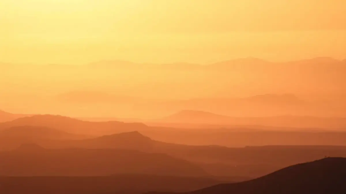 Generic image of a hazy sky over a Canarian volcanic landscape.