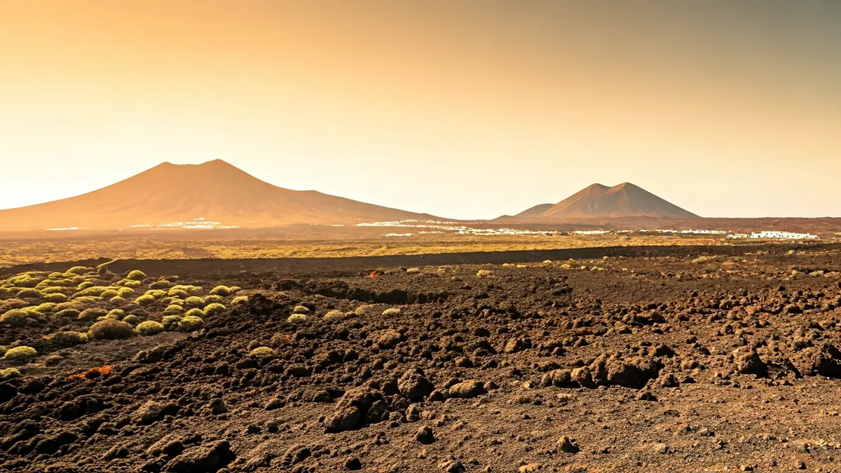 Imagen simbólica de una barrera o frontera en un paisaje canario, representando la contención de migrantes.
