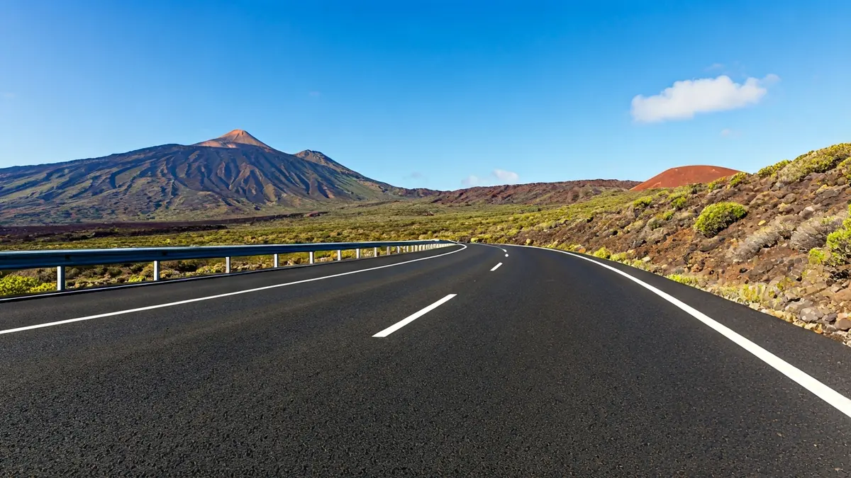 Image of a newly paved road in a Canarian natural environment.