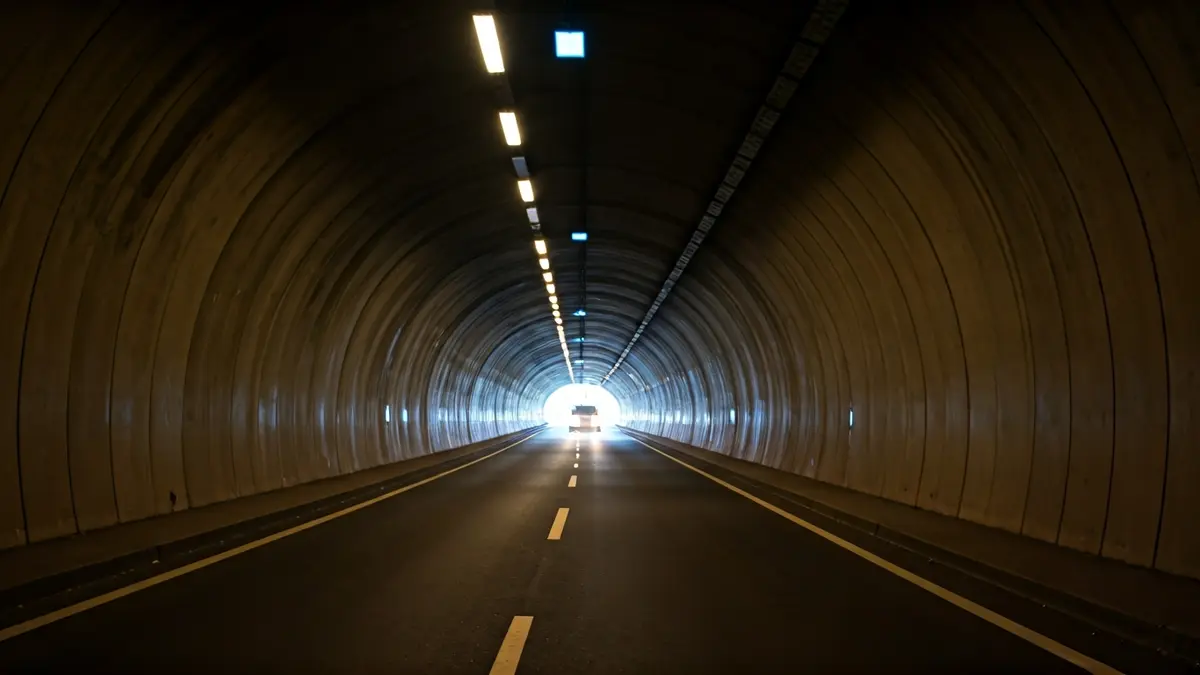 Generic image of a road tunnel with poor lighting, suggesting a road safety hazard.