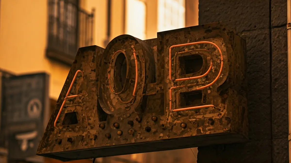Vintage neon sign of a historic perfumery in Santa Cruz de Tenerife.