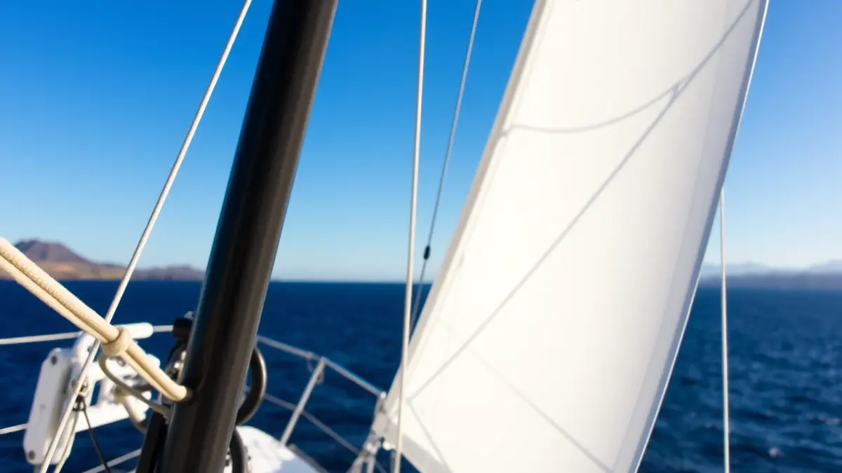Generic image of a sailboat mast on a windless day in Las Palmas de Gran Canaria bay.