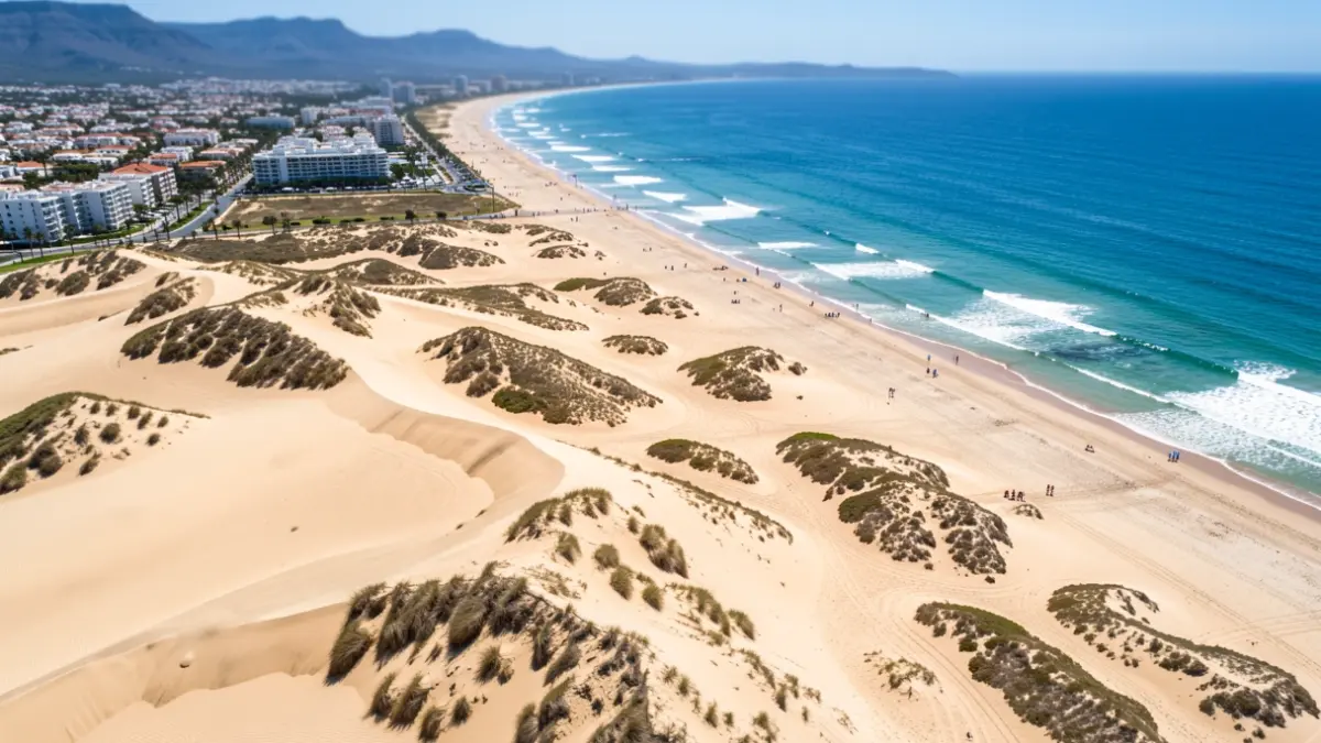 Aerial view of the Maspalomas dunes and the coast of Playa del Inglés in Gran Canaria.