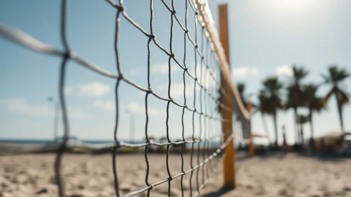 Generic image of a volleyball net on a beach court.