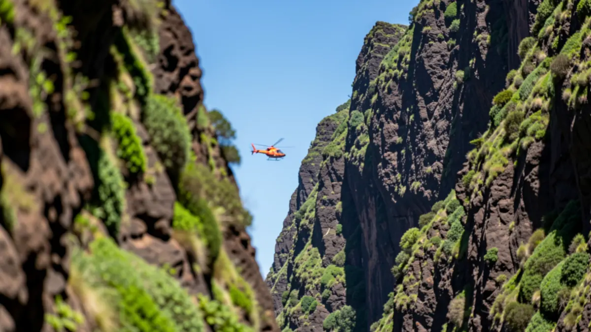 Generic image of a canyon in the Canary Islands with a rescue helicopter.