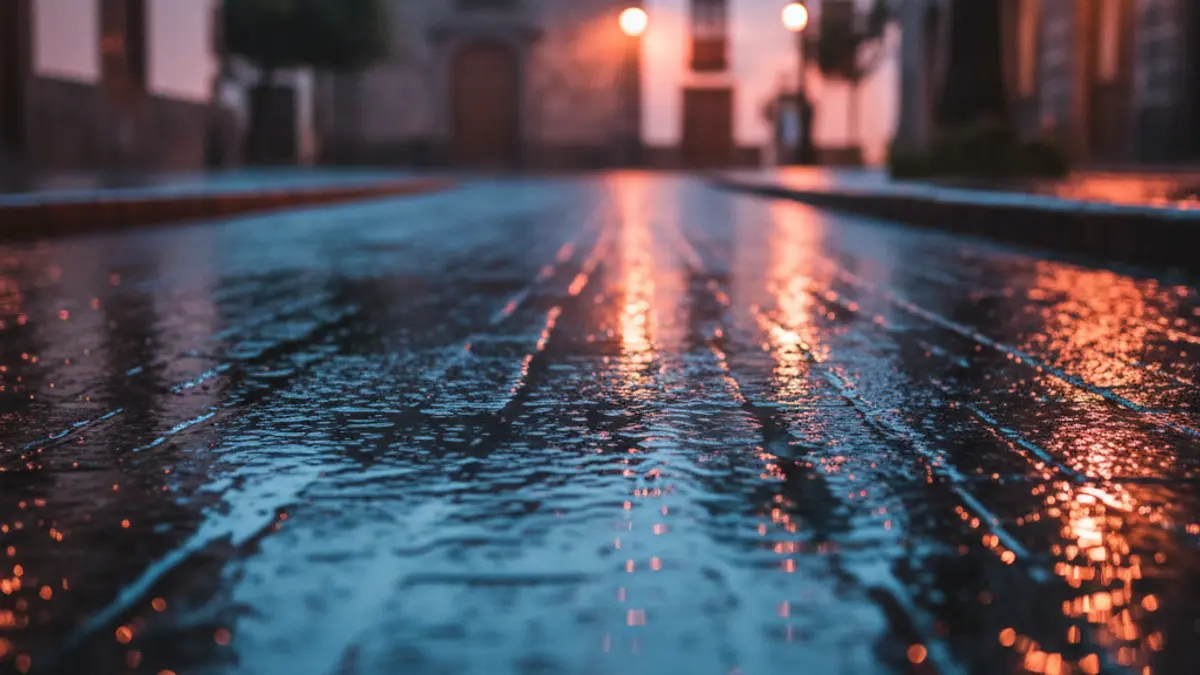 Generic image of emergency lights reflected on wet asphalt.
