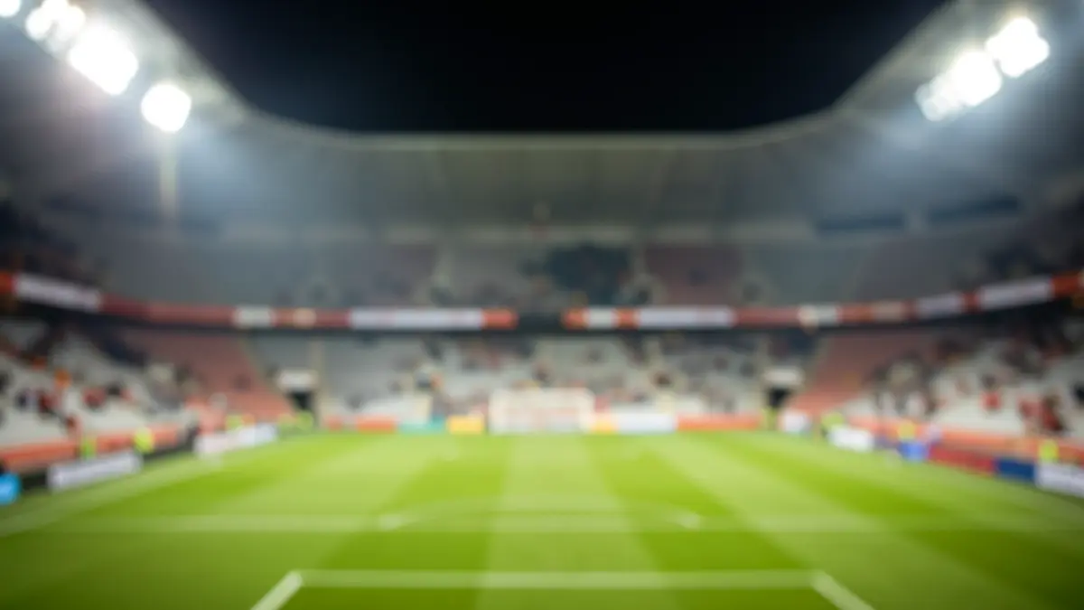 Generic image of an empty football stadium with lights on.