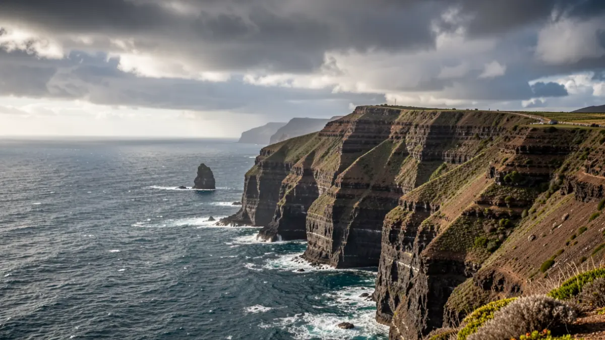 Dramatic coastal landscape in Tenerife with cliffs and the ocean.