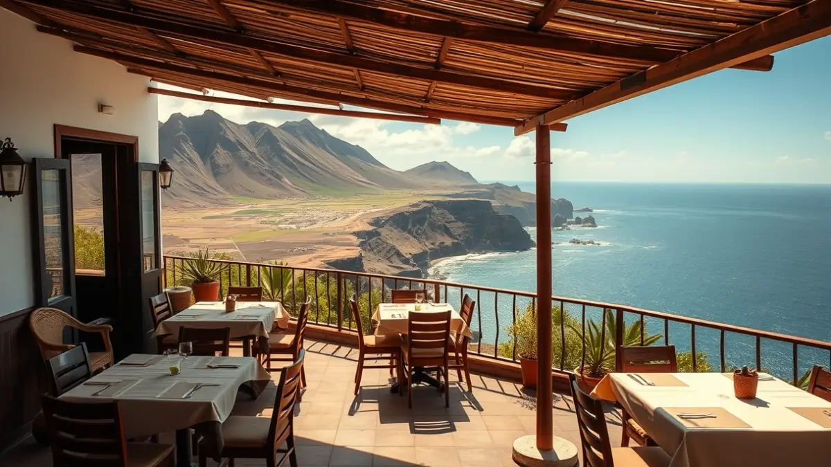 Canarian restaurant terrace with sea and volcanic cliff views.