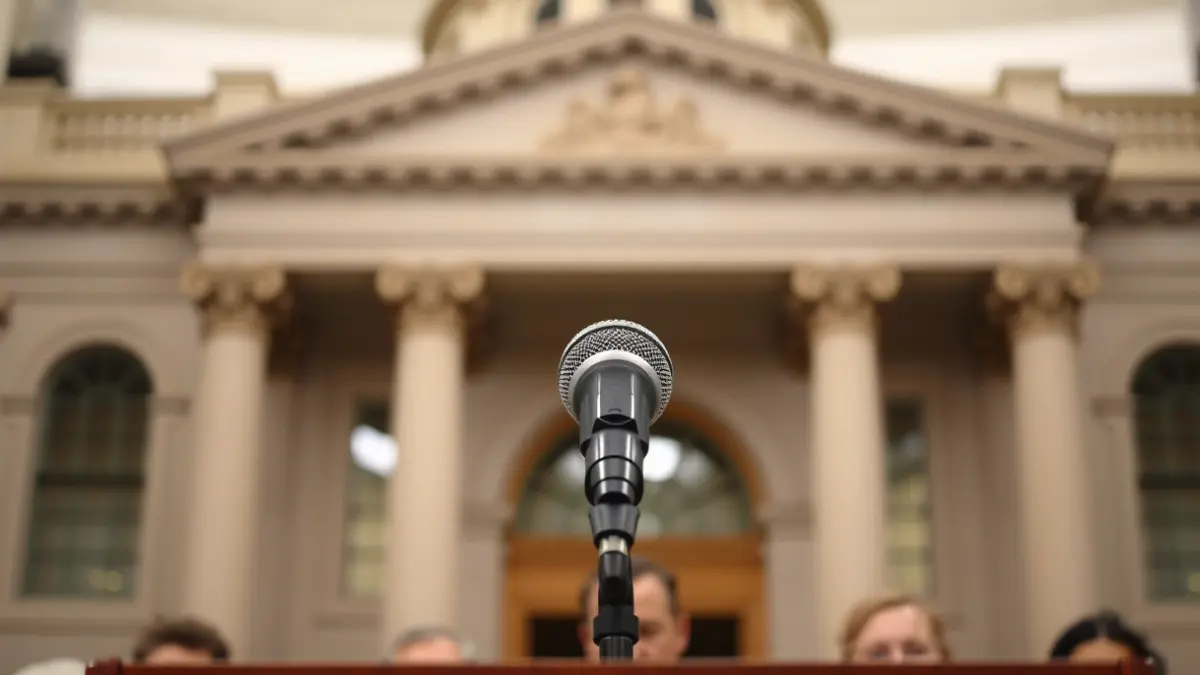 Generic image of a microphone on a podium, symbolizing a political statement or press conference.