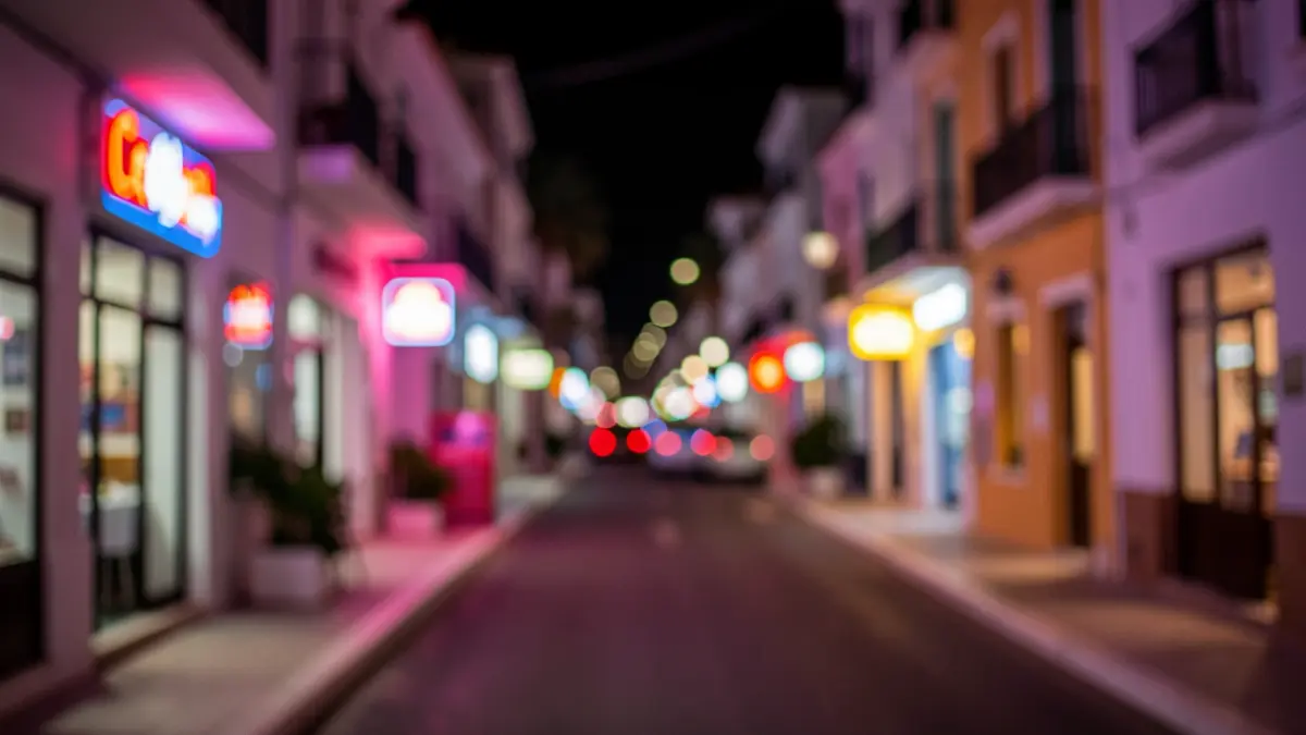 Generic image of a nightlife area in the Canary Islands with blurred neon lights.