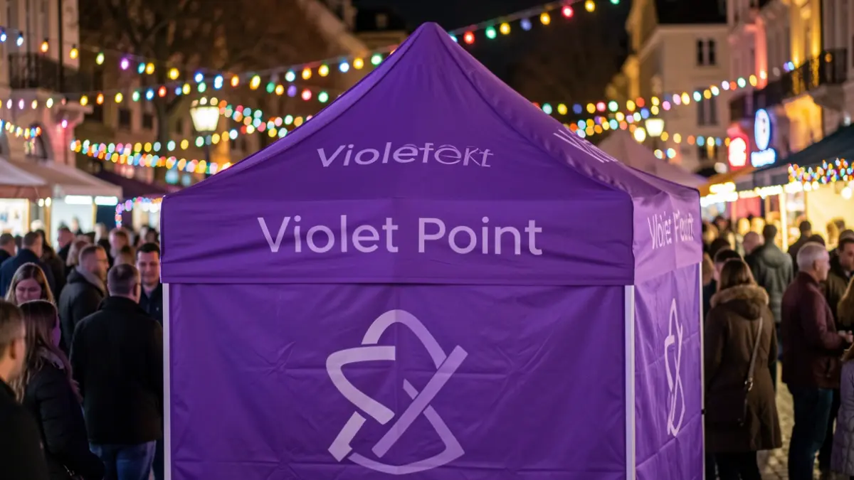 Generic Violet Point tent at a festive night event.