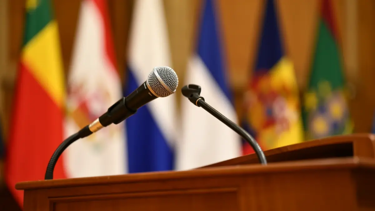 Generic image of a microphone on a podium.