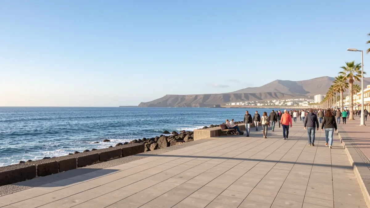 Generic image of a coastal promenade in Arrecife under a clear sky.