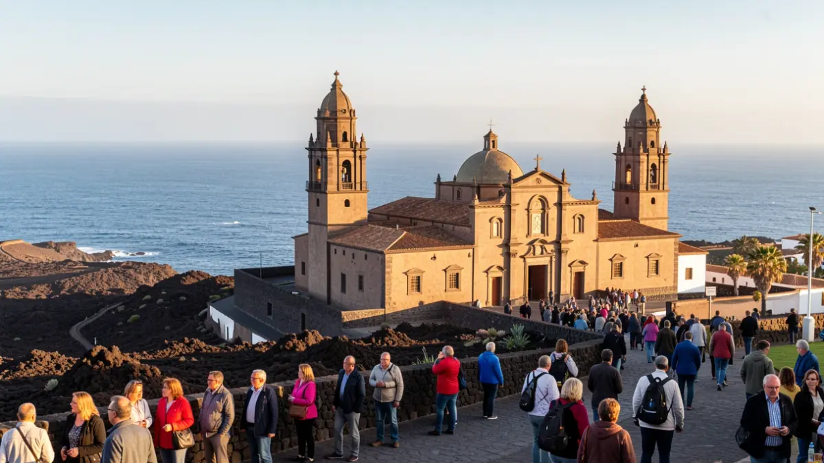 Basílica de Candelaria en Tenerife, con paisaje volcánico y el océano de fondo.