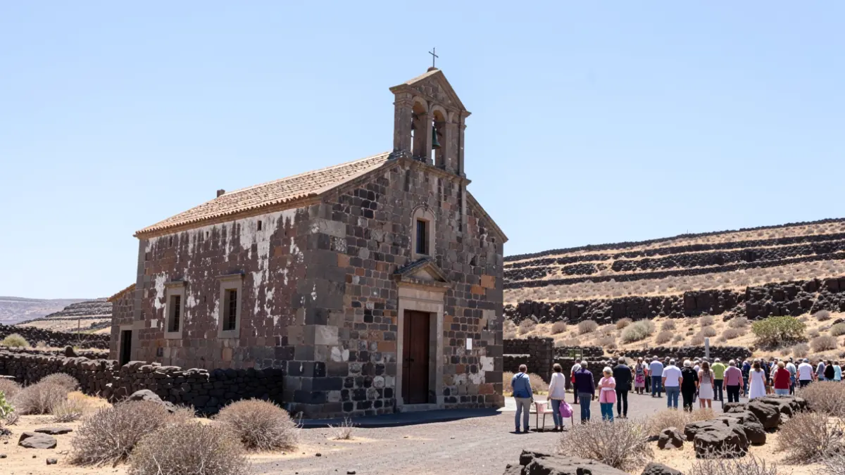 Facade of a historic stone church in Fuerteventura.