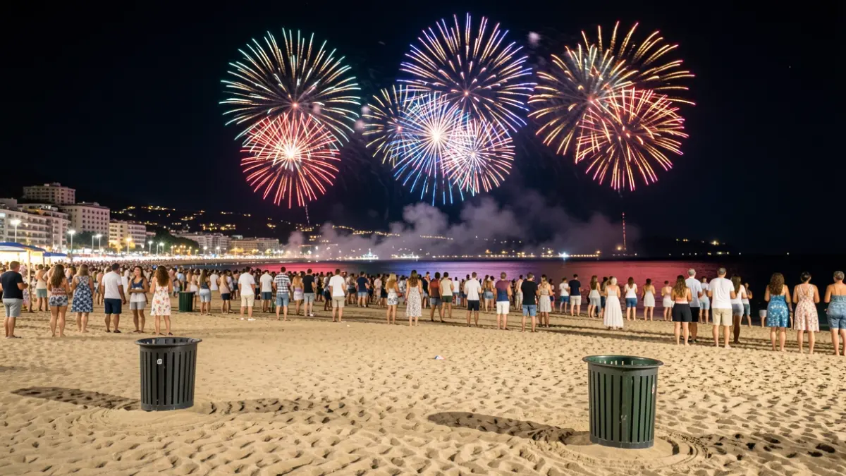 Generic image of a festive beach at night with fireworks lights and people in the background, with empty trash bins.